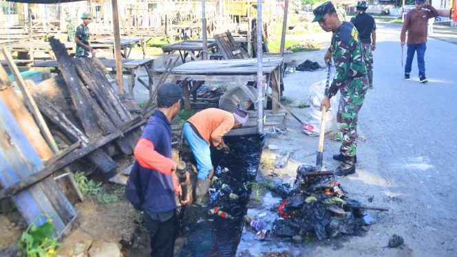 
					Kodim 1304/Gorontalo Gelar Karya Bakti Pembersihan Lingkungan Pasar