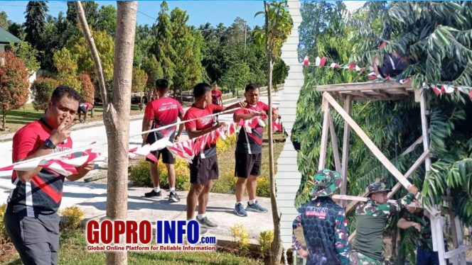 
					Personel Kodim 1314 Gorontalo Utara Gotong Royong Hias Makodim Sambut HUT RI