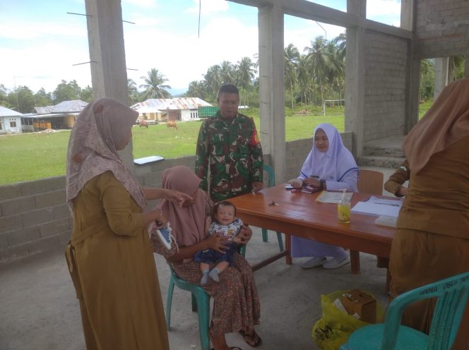 
					Peran Aktif Babinsa Suwawa Tengah Dampingi Posyandu di Wilayah Binaan